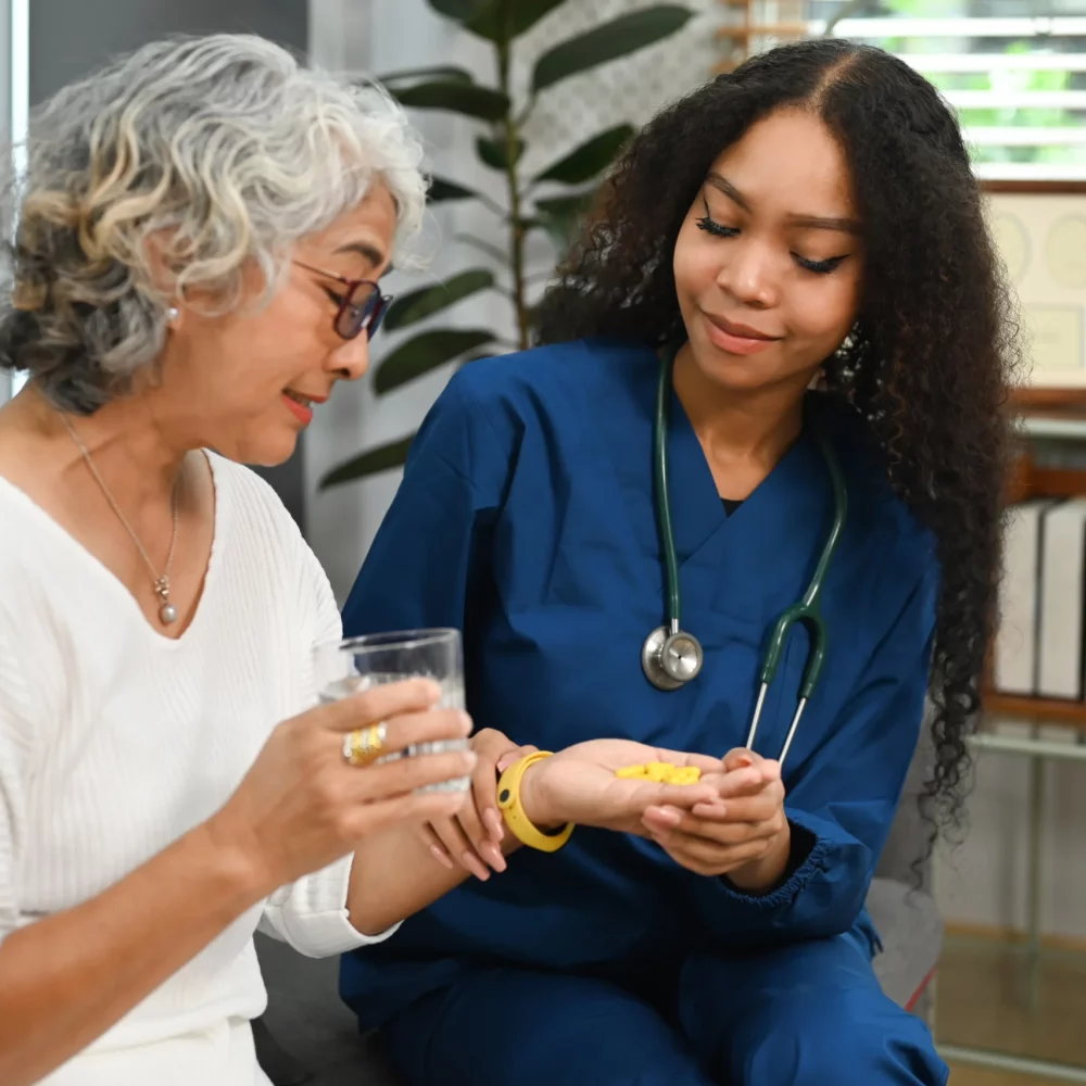 healthcare-worker-or-caregiver-explaining-medicine-2022-12-29-00-52-02-utc